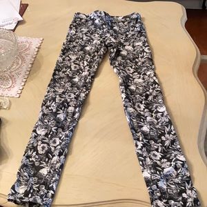 Jean pants with floral pattern by H & M